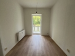 Helle Wohnung mit Balkon und Wohlfühlcharakter in Ebersdorf - Schlafzimmer