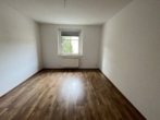 Helle Erdgeschosswohnung – mit Einbauküche & Pachtgarten auf Wunsch - Schlafzimmer