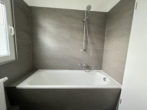 Helle Erdgeschosswohnung – mit Einbauküche & Pachtgarten auf Wunsch - mit Badewanne