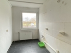 Über wenige Stufen in Ihr neues Zuhause im 1. Obergeschoss - Beispielbild Küche