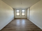 Helle Wohnung mit Balkon in Hilbersdorf – Stellplatz optional verfügbar - Wohnzimmer