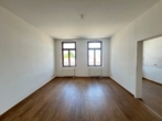 Wohnen mit Weitblick – stilvolle Altbauwohnung in zentraler Lage - Wohnzimmer