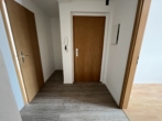 Helle Neubauwohnung in ruhiger, grüner Lage - Einbauküche möglich - Eingangsbereich